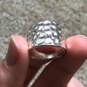 Silver Ring with Impressions in it